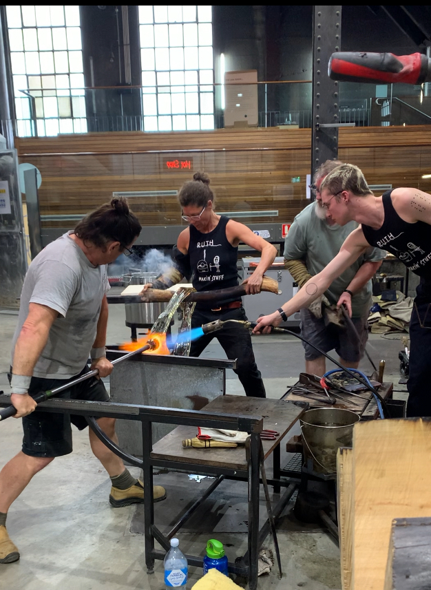 Ruth Allen and Ben Edols in a glass workshop